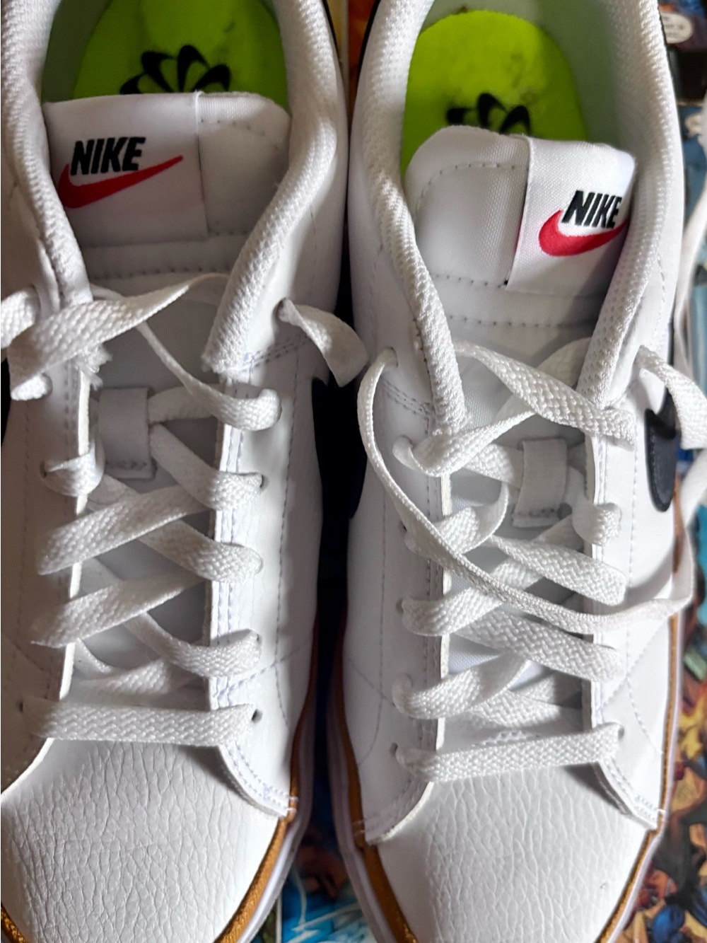 Nike Kids White Sneakers with Black Swoosh and Red Logo